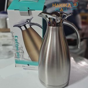 Silver Stainless Steel 2L Vacuum Flask - Eco-friendly, Large Capacity, Portable Drinkware for Hot and Cold Beverages. Enjoy long-lasting temperature retention in a sleek and durable design.